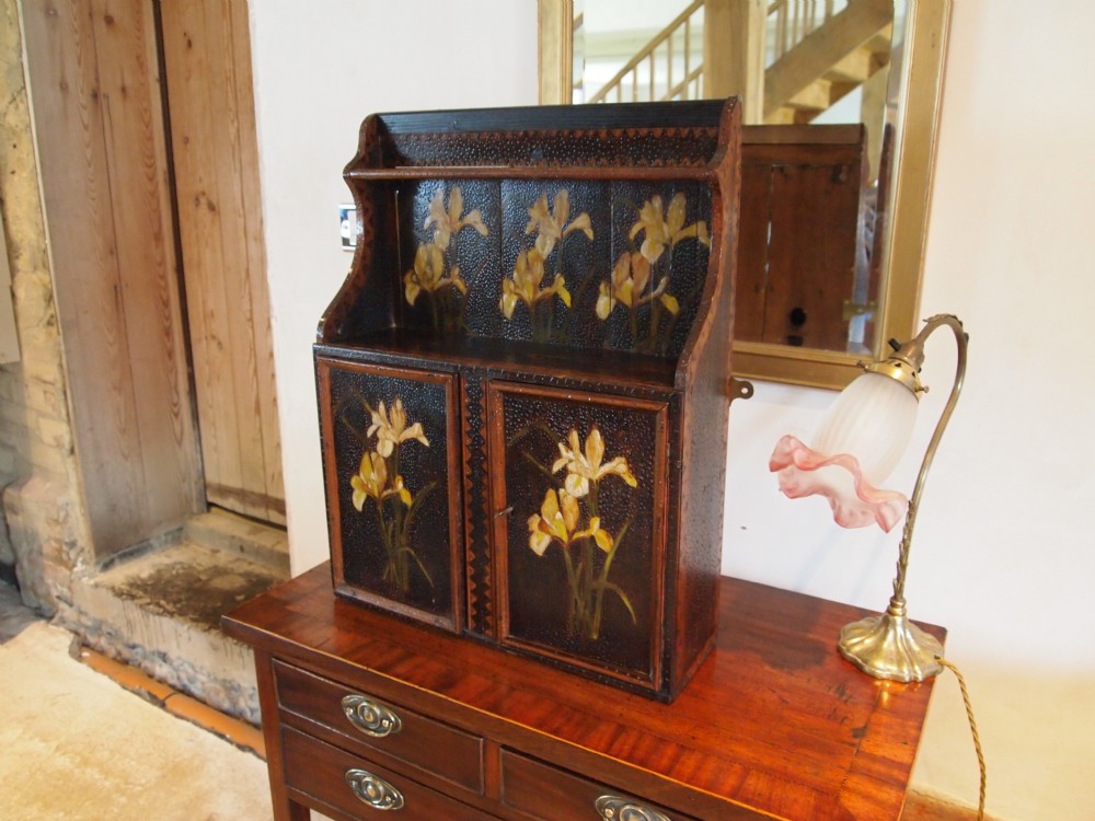Cupboard cabinet Arts and Crafts pokerwork and oil painted Iris c1900