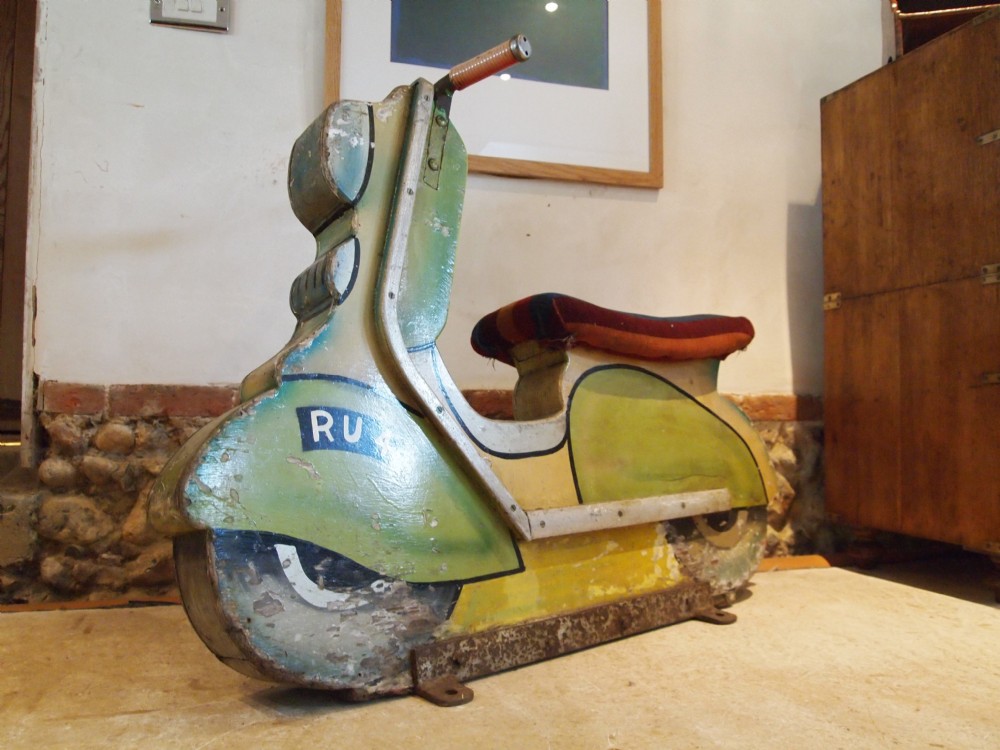 Fairground ride 1950's scooter Brighton pier wooden carousel scooter