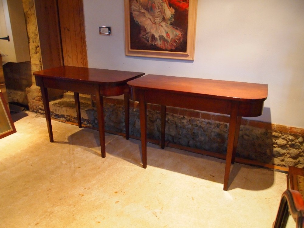 Tables pair of George III Mahogany D end hall side console tables c1800
