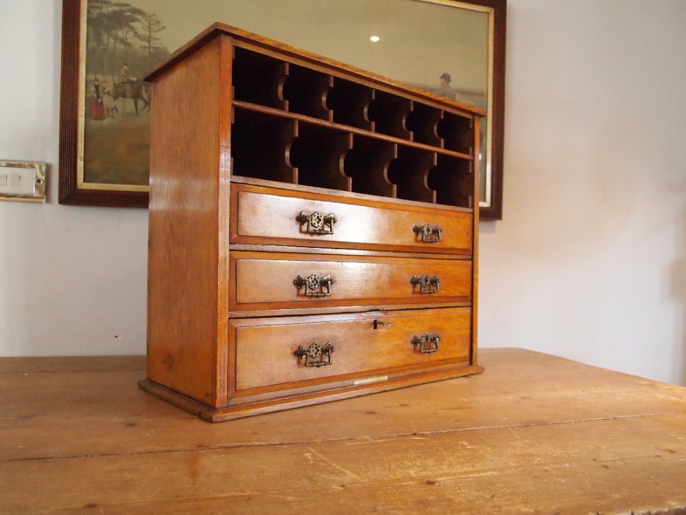 Chest of drawers Arts and Crafts Oak desk top cabinet c1880