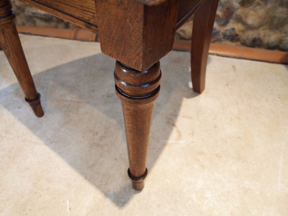 Chairs pair of William IV carved Oak hall chairs c1835 View VII