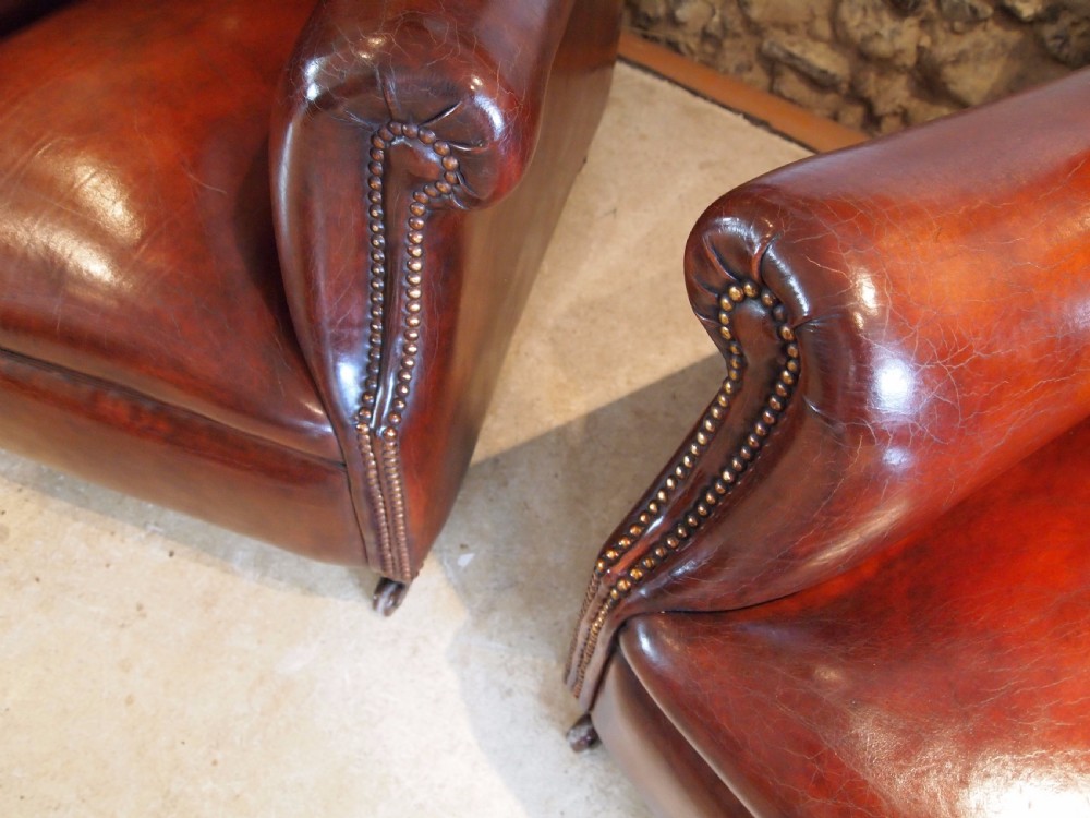 Armchairs fine pair of Victorian Chestnut leather club chairs c1880 View II