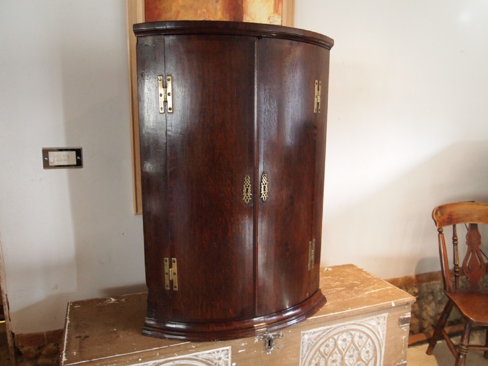 Cupboard corner George III Oak bowfront c1770