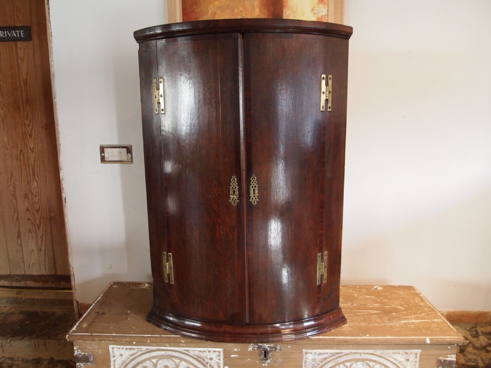 Cupboard corner George III Oak bowfront c1770 View VI