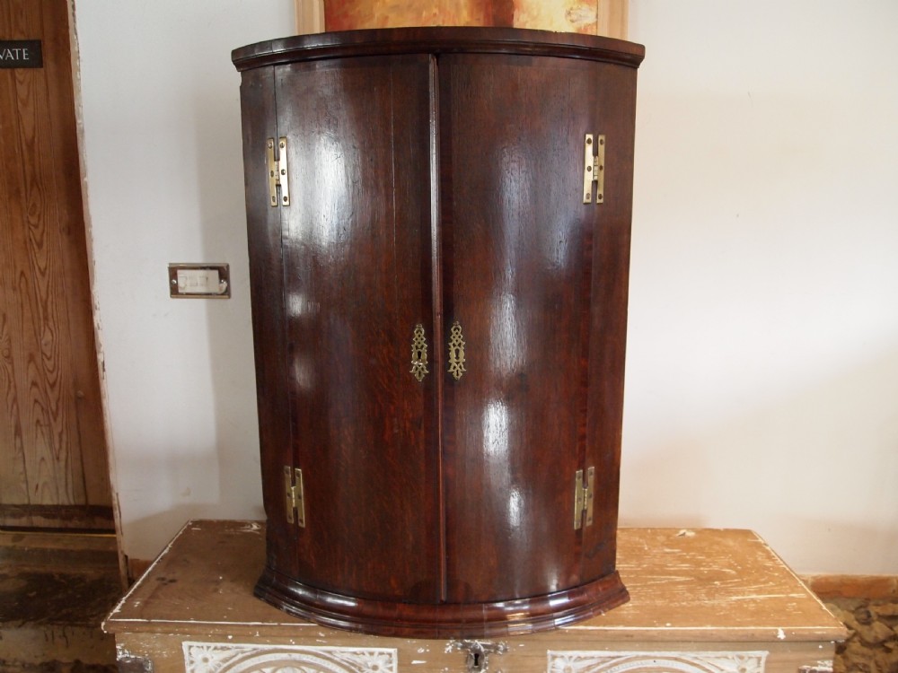 Cupboard corner George III Oak bowfront c1770 View XI