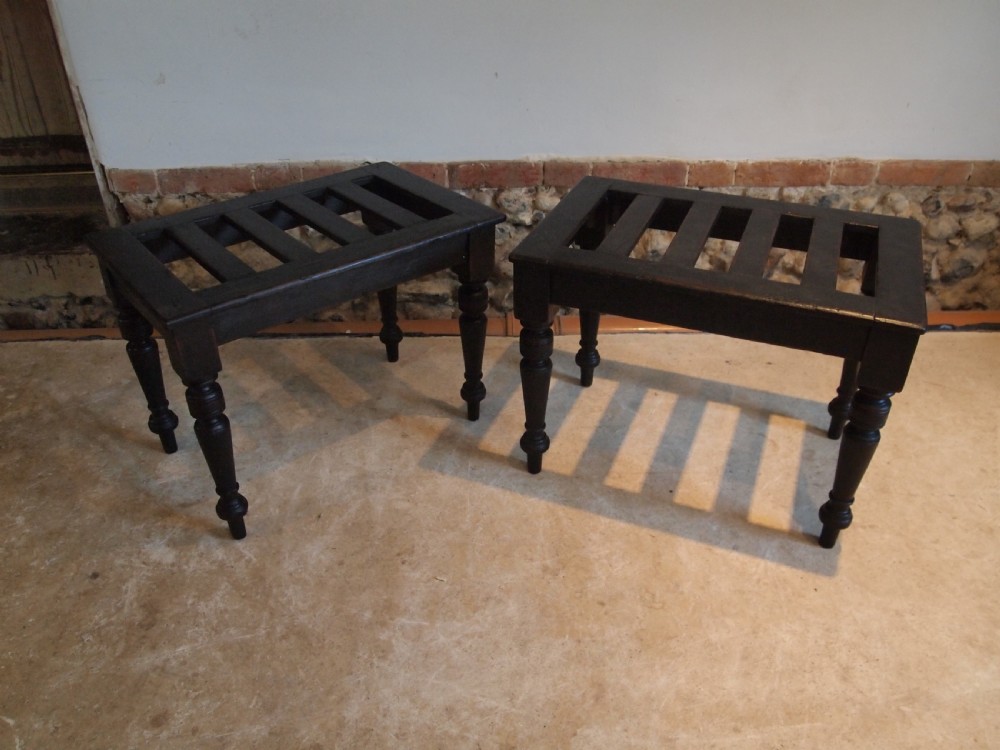 Pair of Victorian ebonised luggage stands c1880