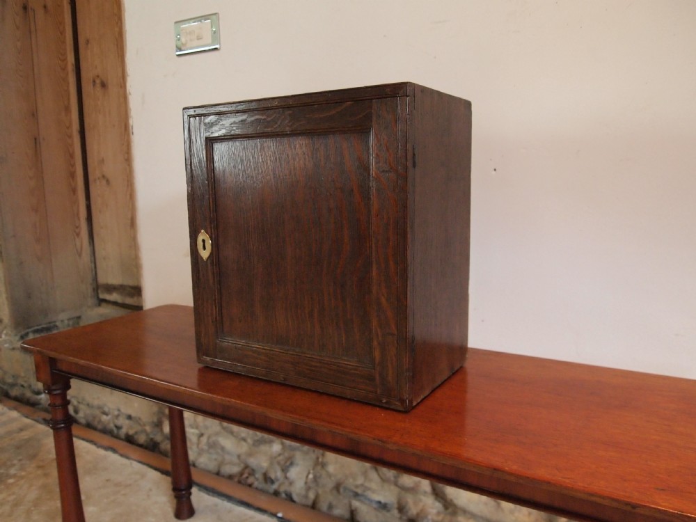 Cabinet spice cupboard George III Oak c1790