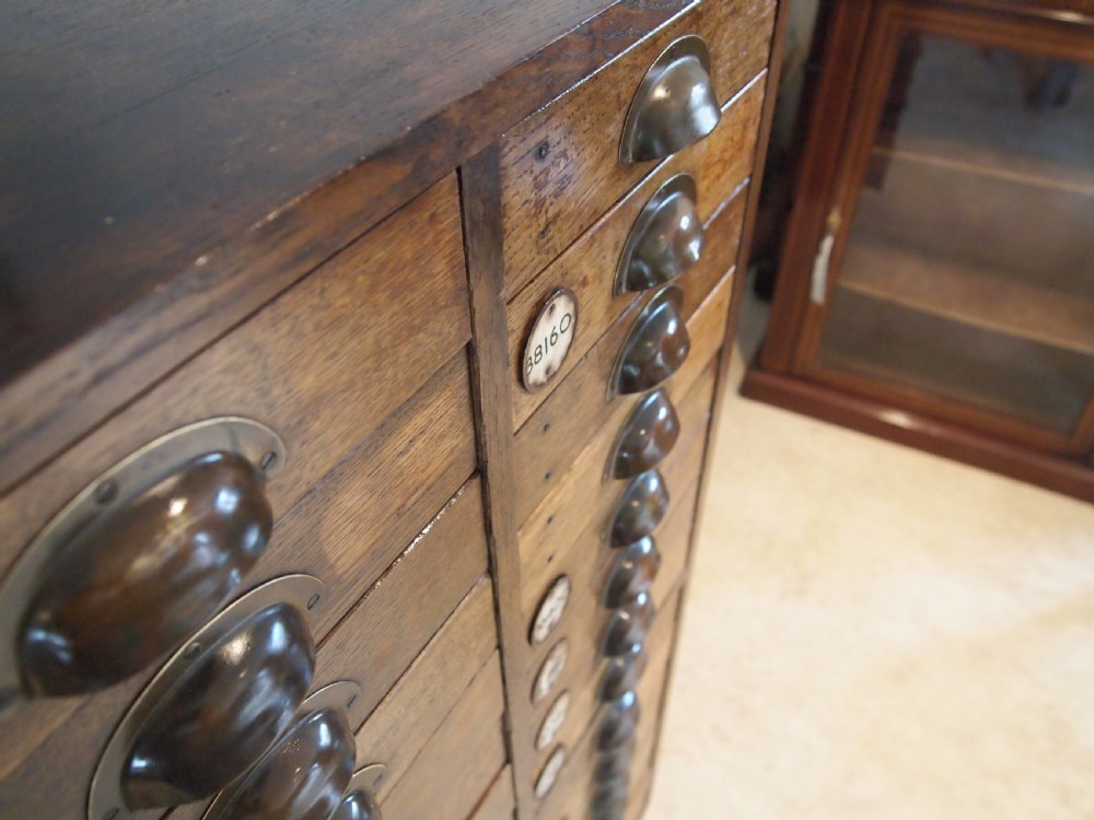 Chest of drawers Oak collectors chest bank c1910 View XIV