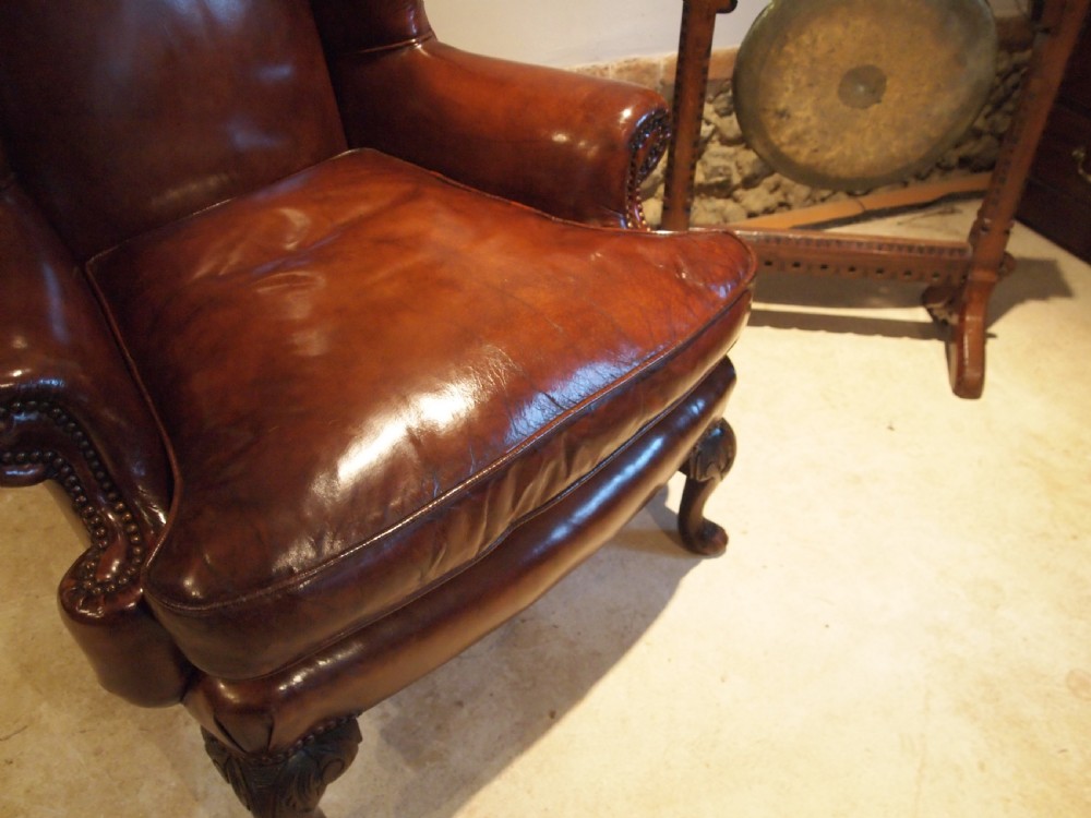 Chair stunning Chestnut leather Victorian Oak wing armchair c1880 View X