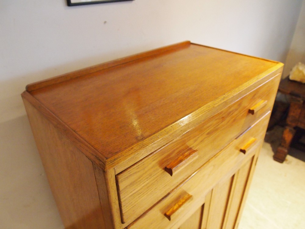 Tallboy cupboard chest of drawers in the manner of Heals Oak c1930 View XIII