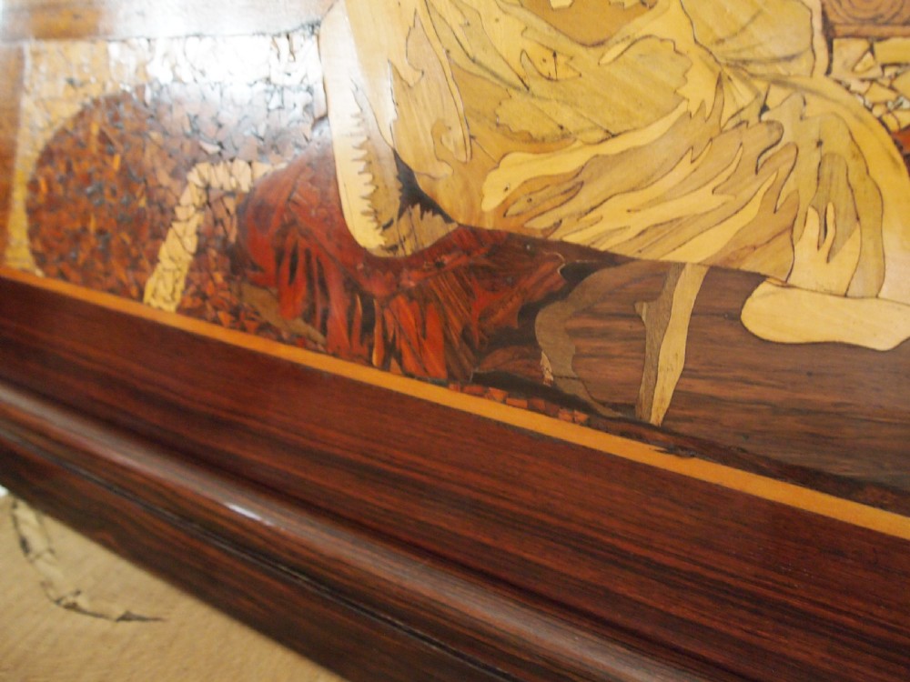 A large rectangular Indian specimen wood marquetry panel depicting a detailed court performance scene framed in dark polished wood. View VI