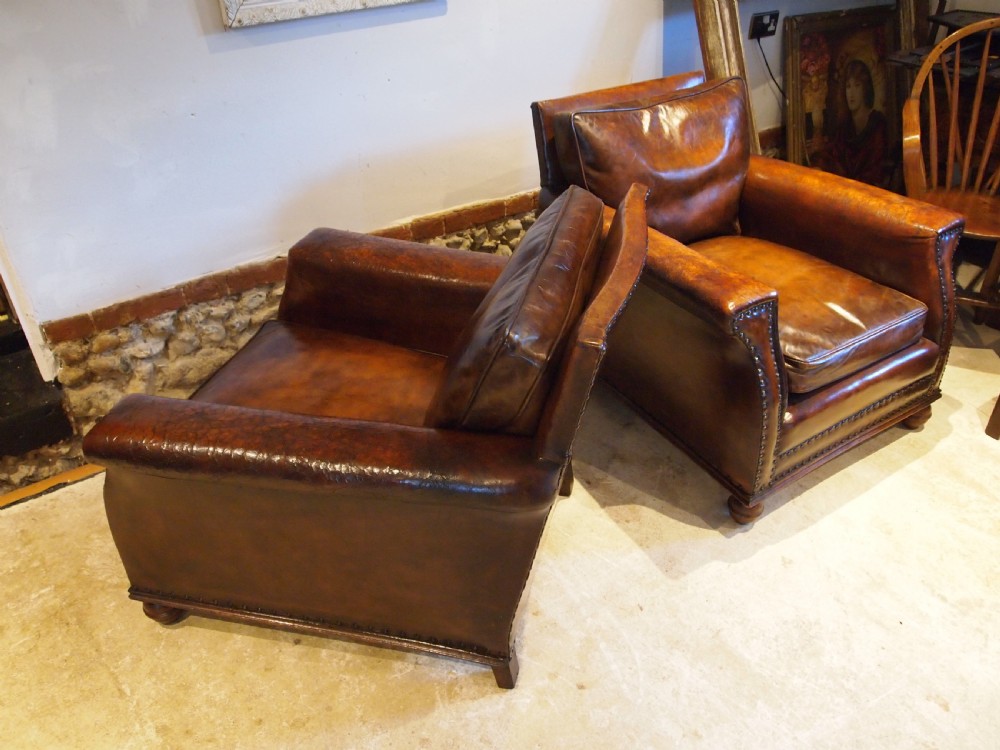 Chairs outstanding pair of Edwardian Chestnut leather club armchairs c1900 View V