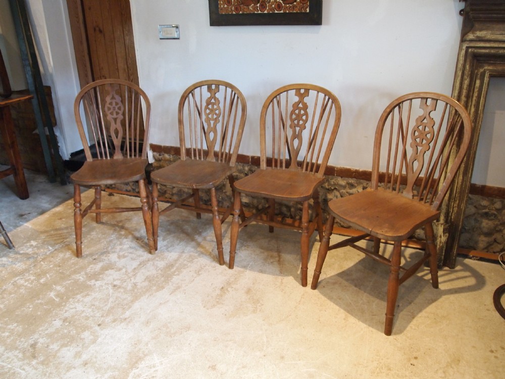 Chairs set of 4 Victorian Windsor Wheel back dining chairs c1890
