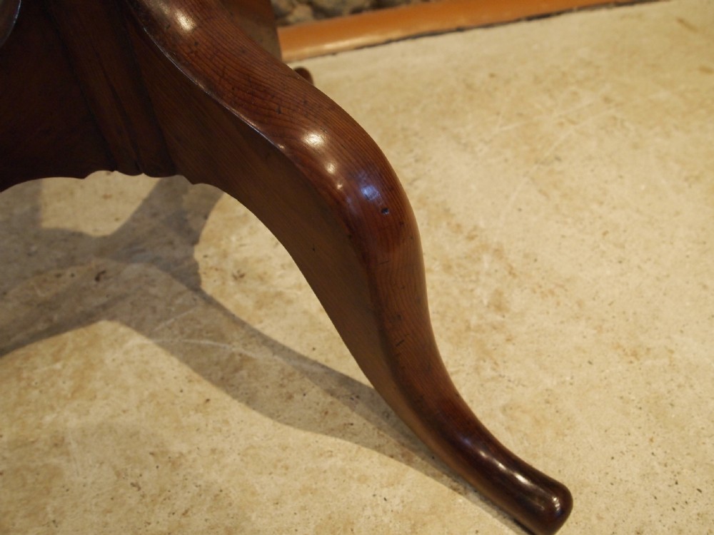 A George III yew wood tripod table featuring a rectangular top supported by a turned central column and three curved cabriole legs. View XIII