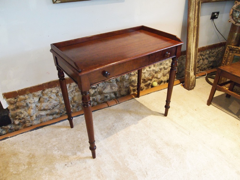 Table fine writing table manner of Gillows Plum pudding Mahogany c1840