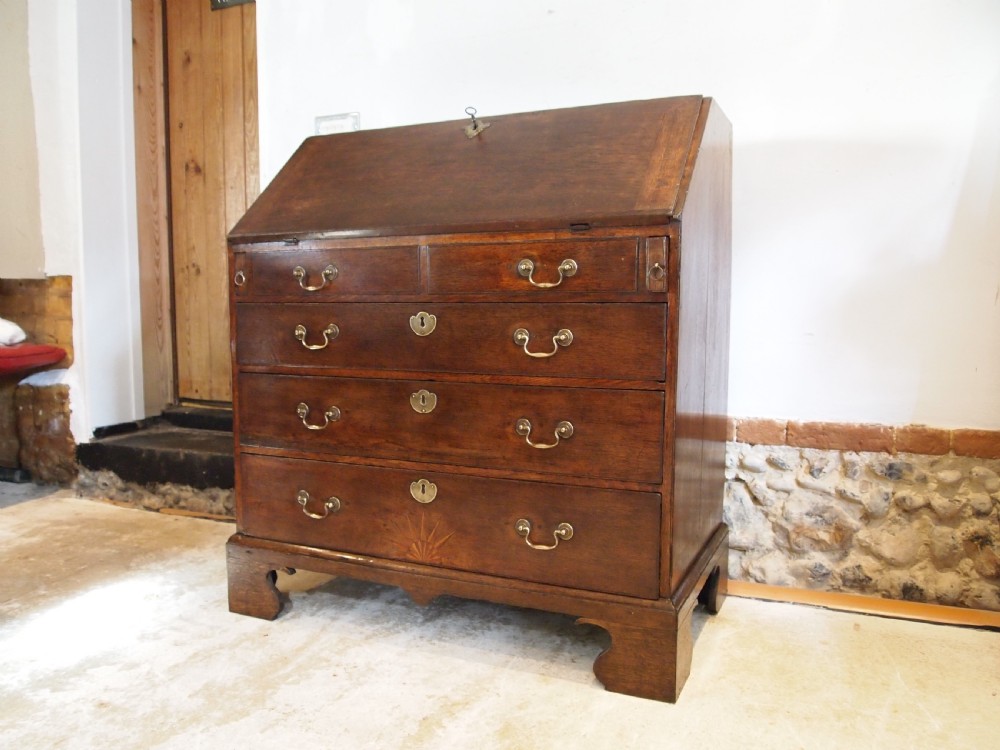 Bureau superb George III Oak sunburst c1760