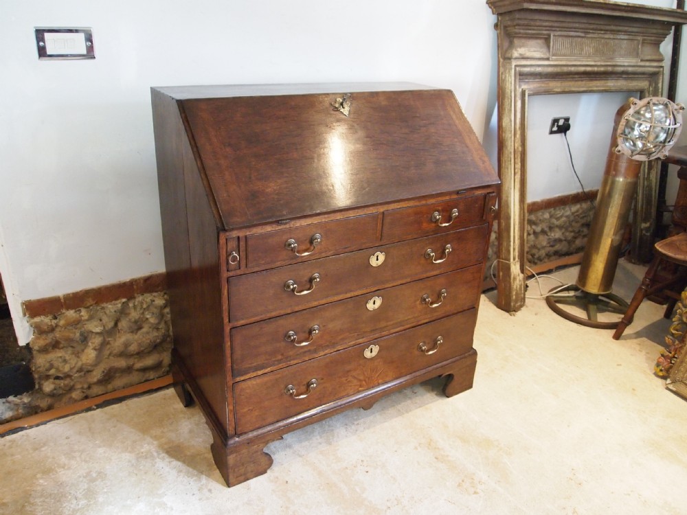Bureau superb George III Oak sunburst c1760 View II