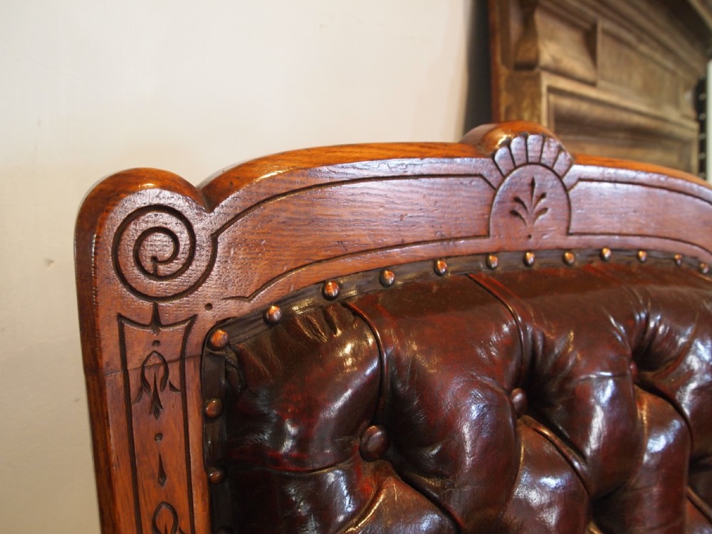 Chairs fine pair of Victorian Oak & Chestnut Leather library easy chairs c1880 View II