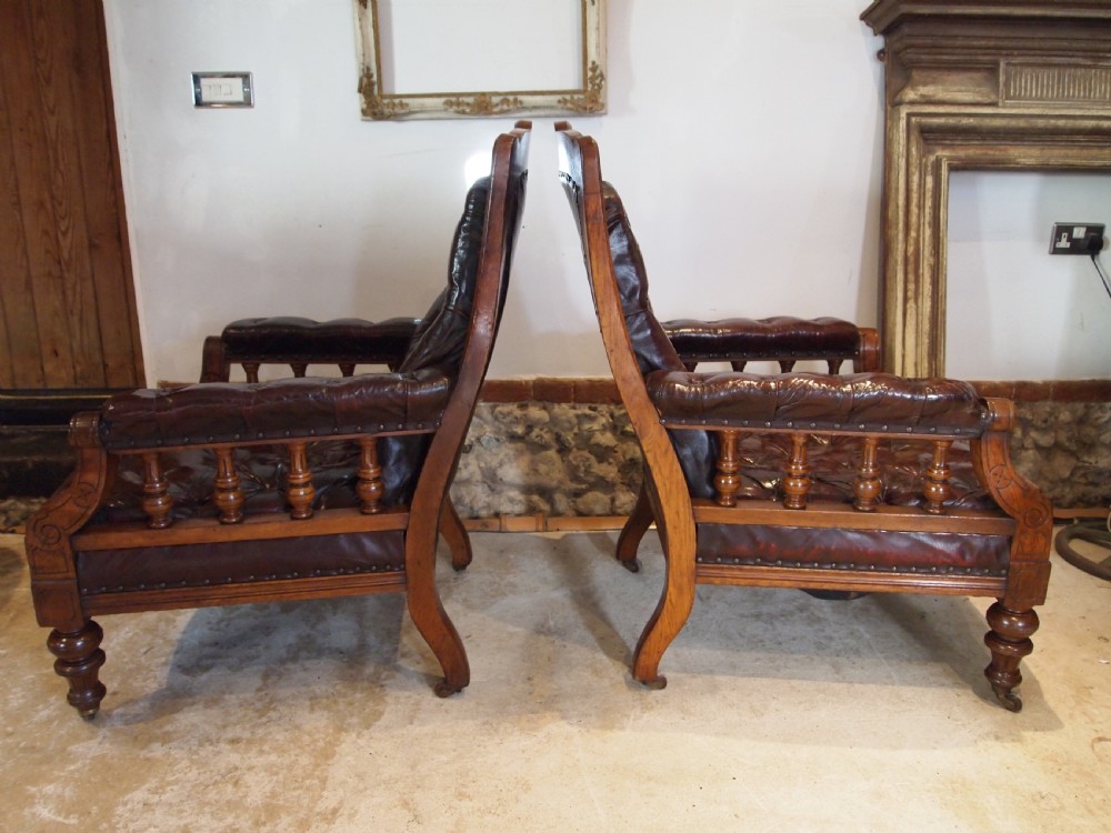 Chairs fine pair of Victorian Oak & Chestnut Leather library easy chairs c1880 View V