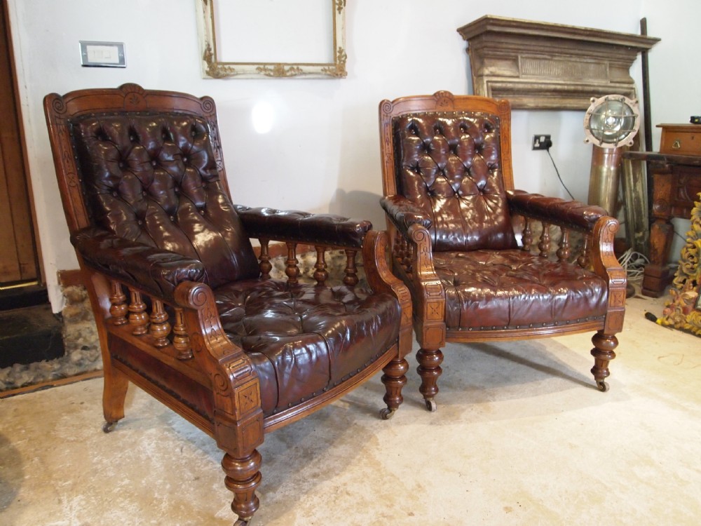 Chairs fine pair of Victorian Oak & Chestnut Leather library easy chairs c1880 View X
