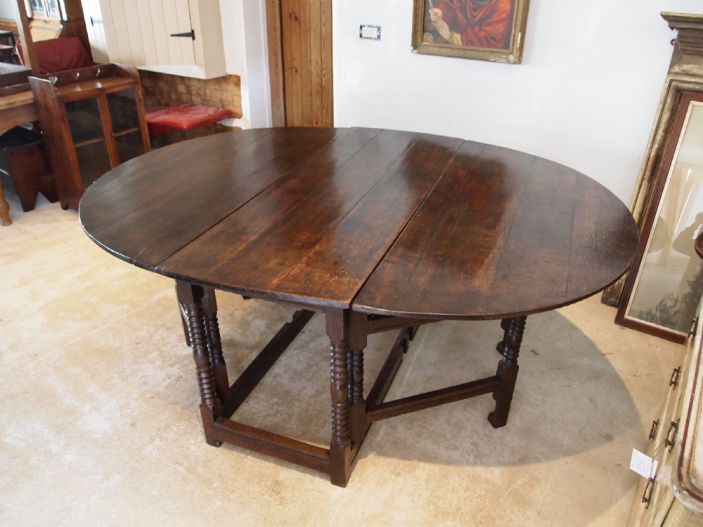 Table large Oak gateleg 18th century and later seats 8 c1700
