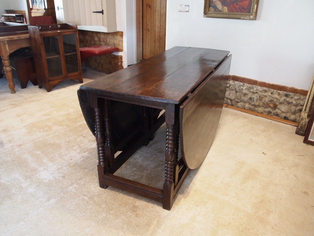 Table large Oak gateleg 18th century and later seats 8 c1700 View II