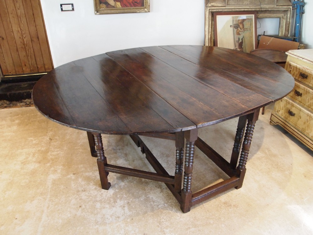 Table large Oak gateleg 18th century and later seats 8 c1700 View V