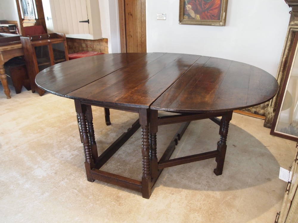 Table large Oak gateleg 18th century and later seats 8 c1700 View IX