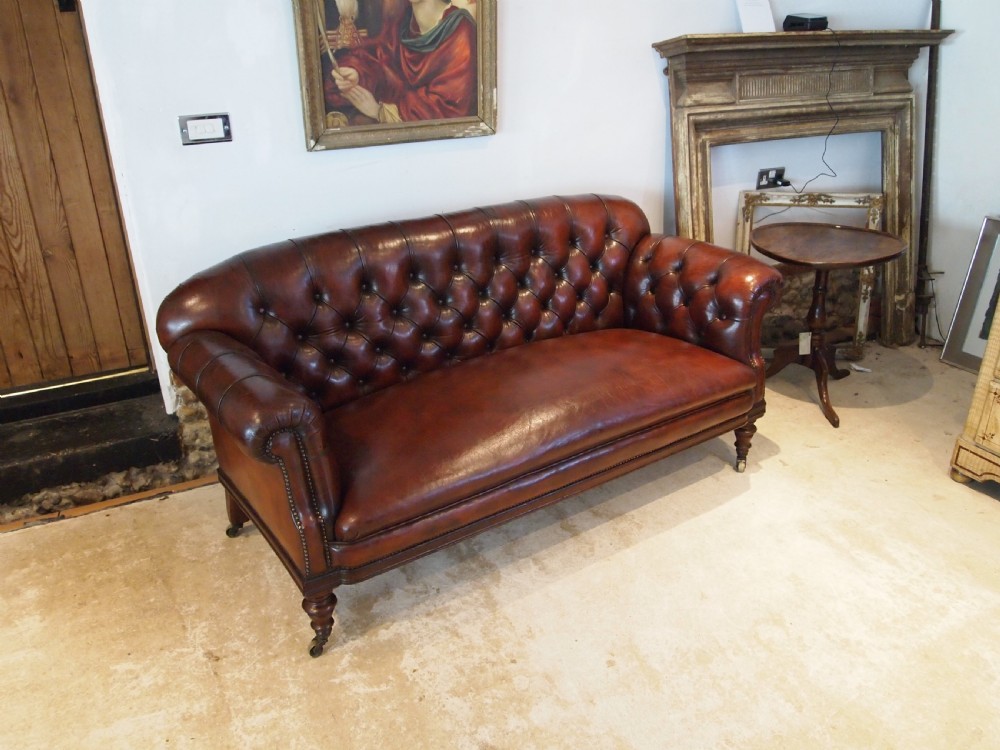 Sofa settee outstanding Victorian Chesterfield Chestnut leather c1870 View II