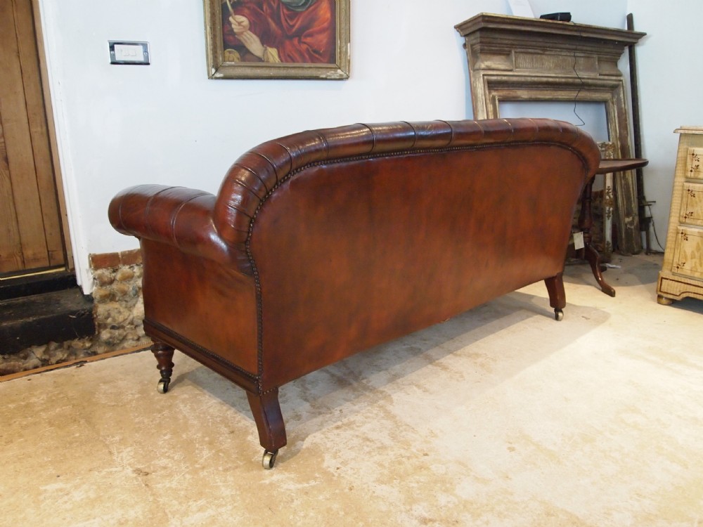 Sofa settee outstanding Victorian Chesterfield Chestnut leather c1870 View VIII