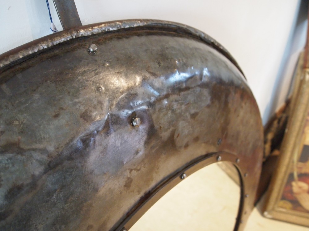 Mirror large industrial metal c1900 View II