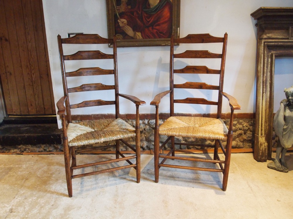 Chairs rare pair of Philip Clissett Arts and Crafts ladderback armchairs c1890