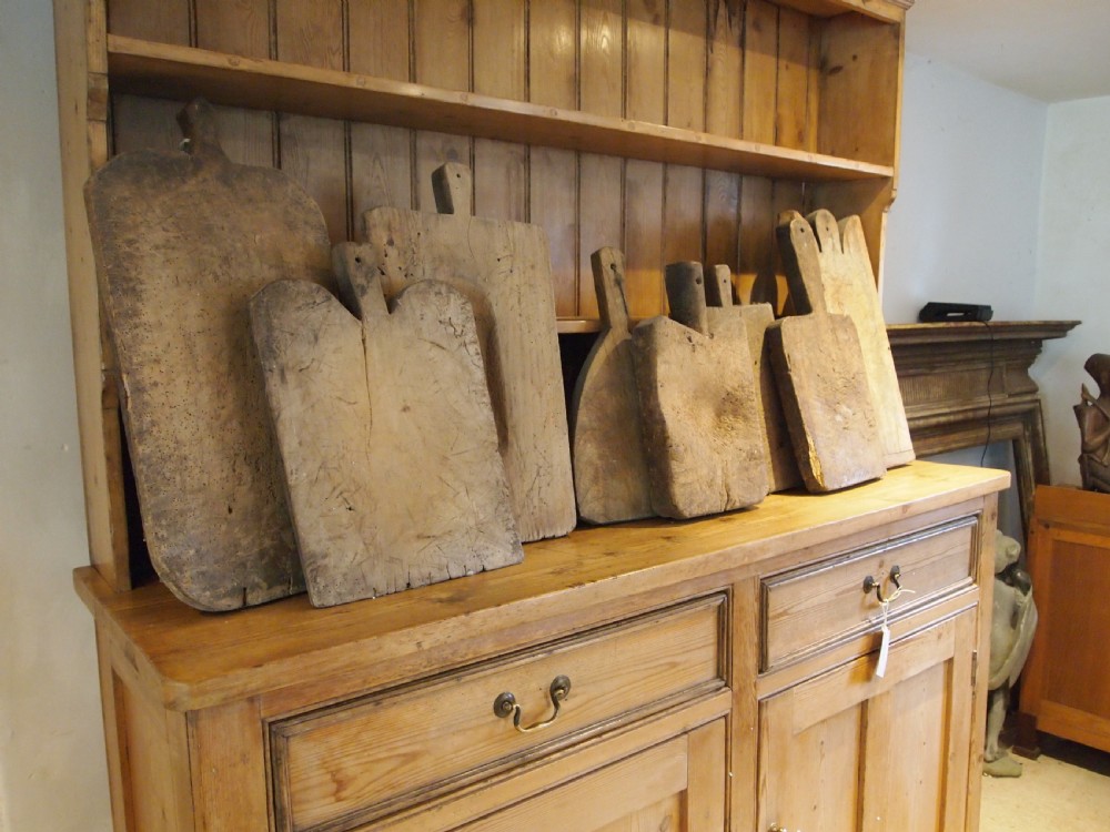 Collection of eight 18th/19th century chopping boards