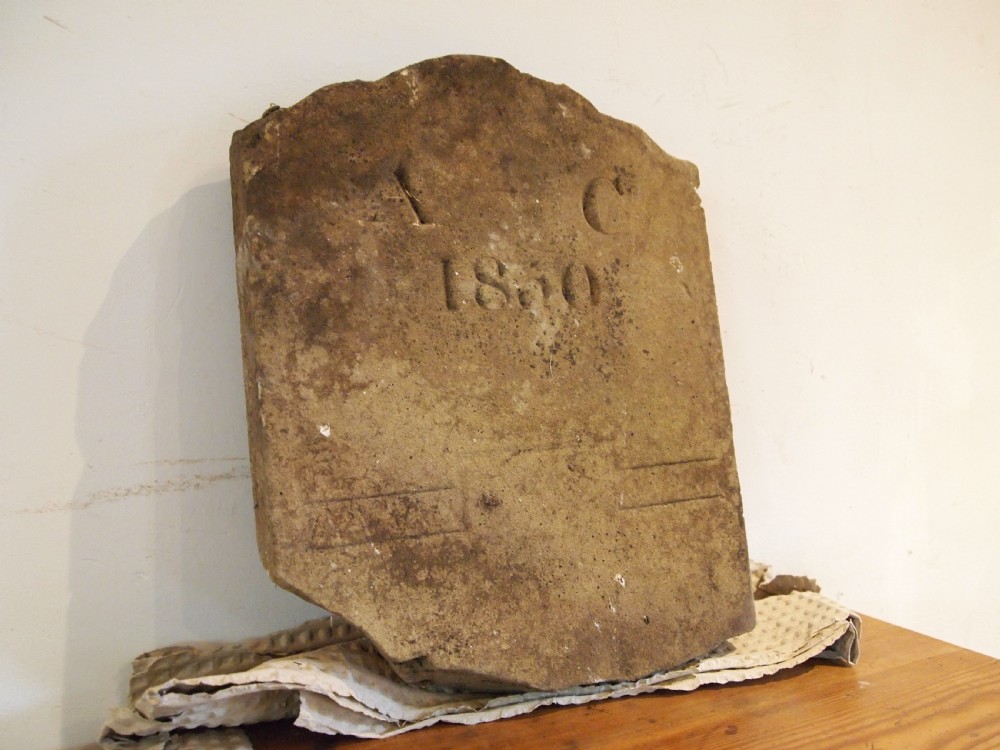 A hand-carved Victorian York stone headstone with chiselled initials A C and date 1860. View V