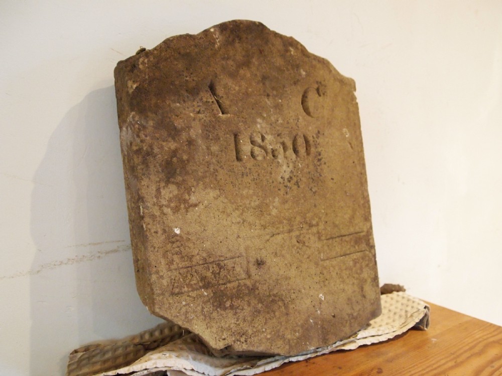 A hand-carved Victorian York stone headstone with chiselled initials A C and date 1860. View VI