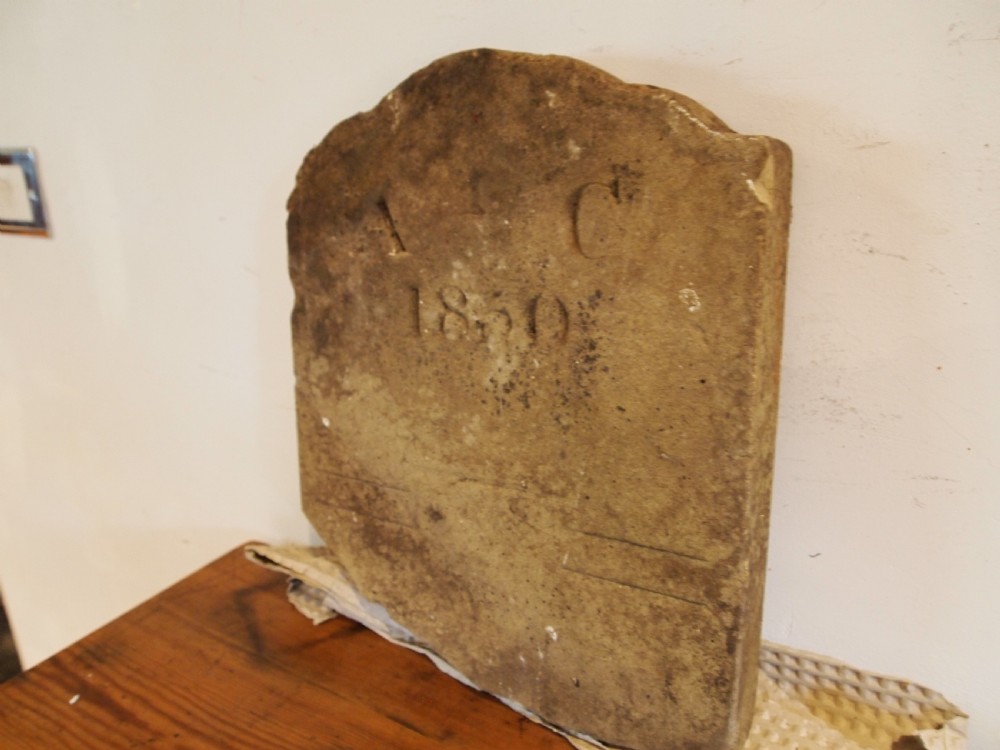 A hand-carved Victorian York stone headstone with chiselled initials A C and date 1860. View VII