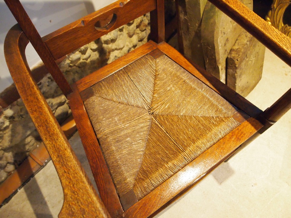 Chairs outstanding pair Arts & Crafts Oak manner of Voysey c1900 View III