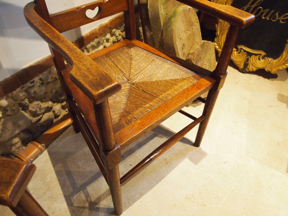 Chairs outstanding pair Arts & Crafts Oak manner of Voysey c1900 View VI
