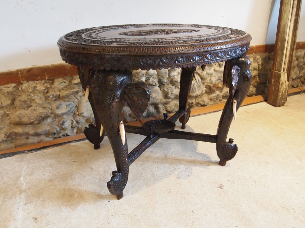 Table carved Padouk Elephant table c1900 View III