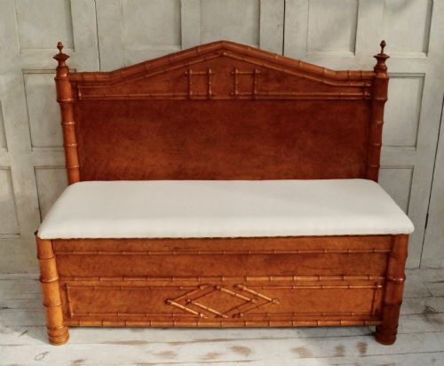 fig 1. An antique faux bamboo hall bench featuring turned timber frame detailing, a shaped backrest with geometric cresting, and an off-white upholstered seat.
