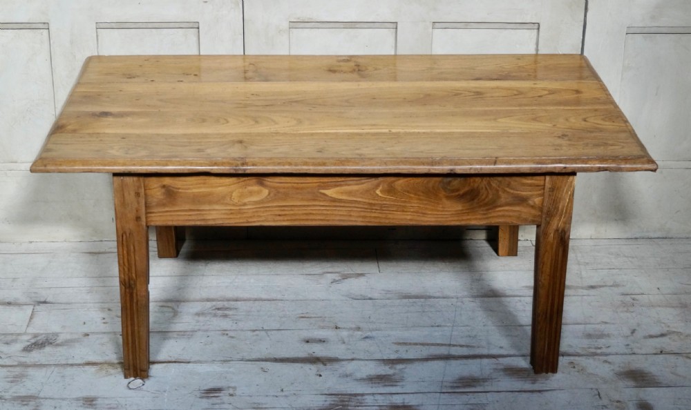 A low rectangular antique French chestnut occasional table with a wide planked top and simple straight legs. View V
