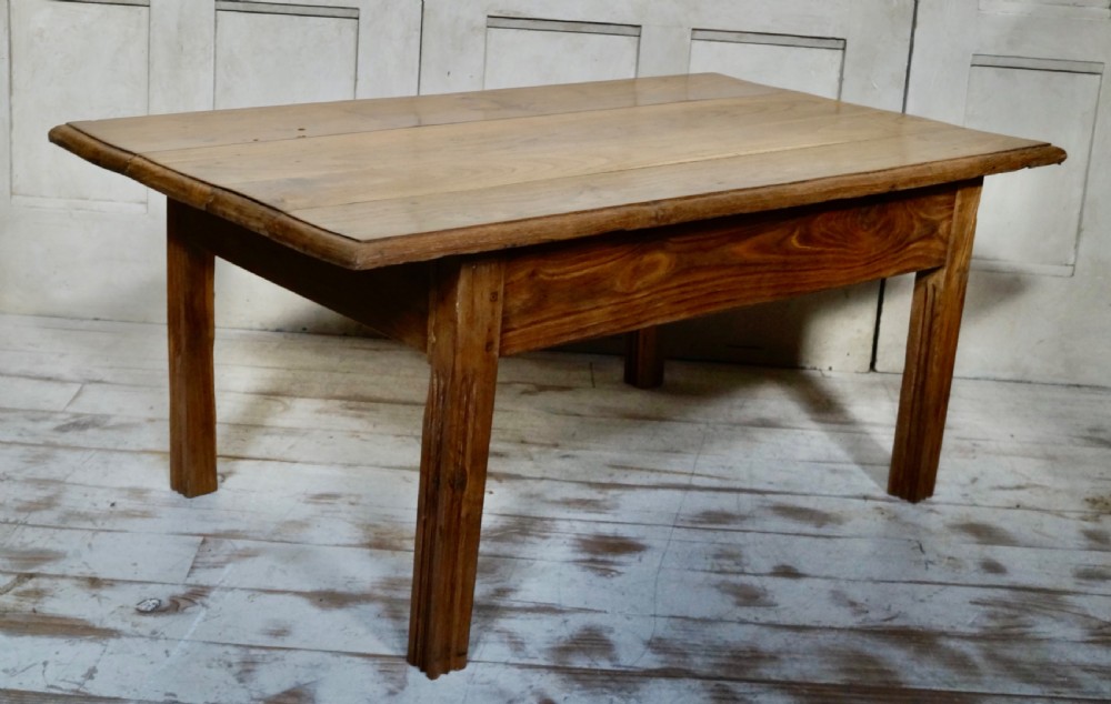 A low rectangular antique French chestnut occasional table with a wide planked top and simple straight legs. View VI