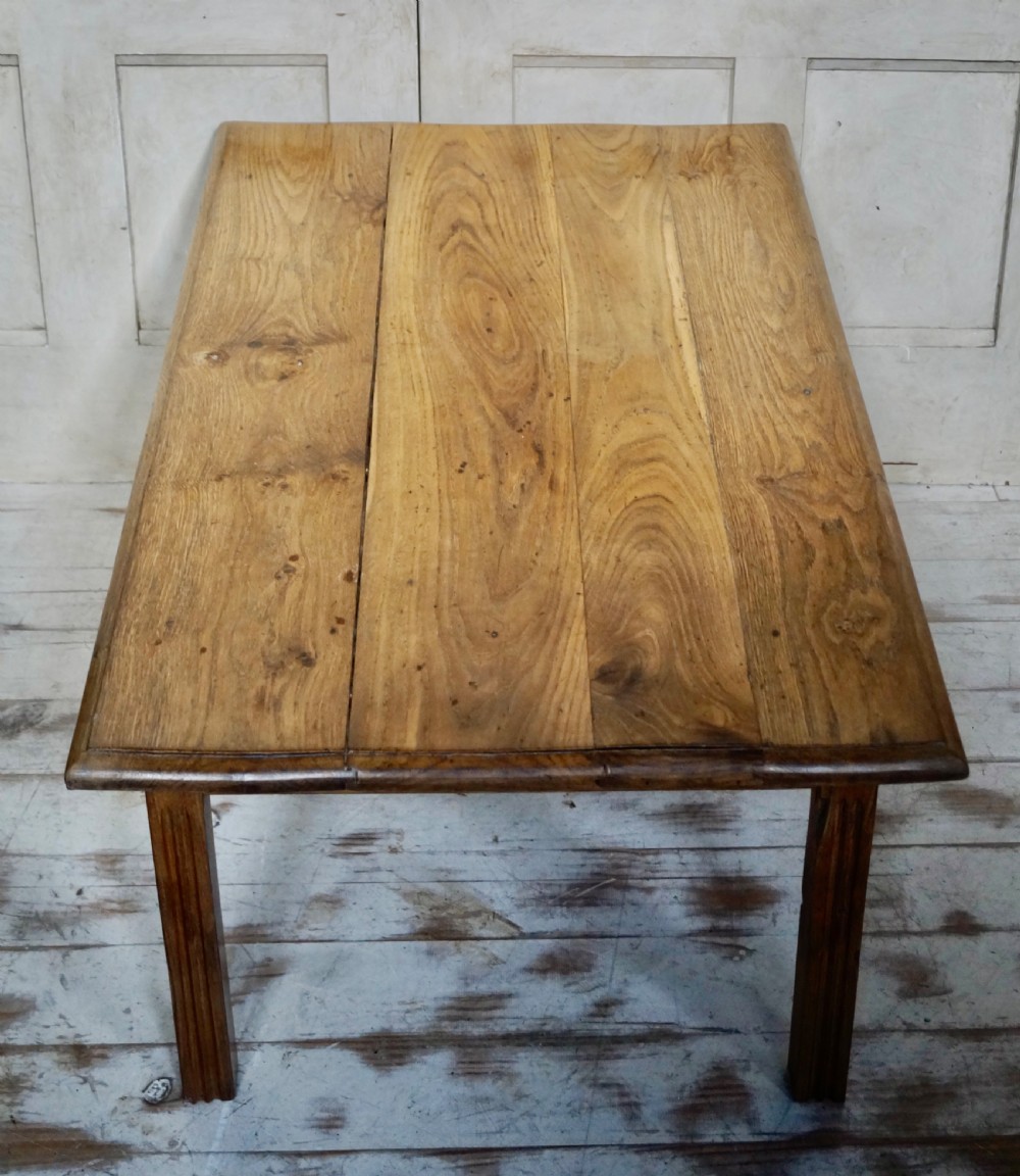 A low rectangular antique French chestnut occasional table with a wide planked top and simple straight legs. View VIII