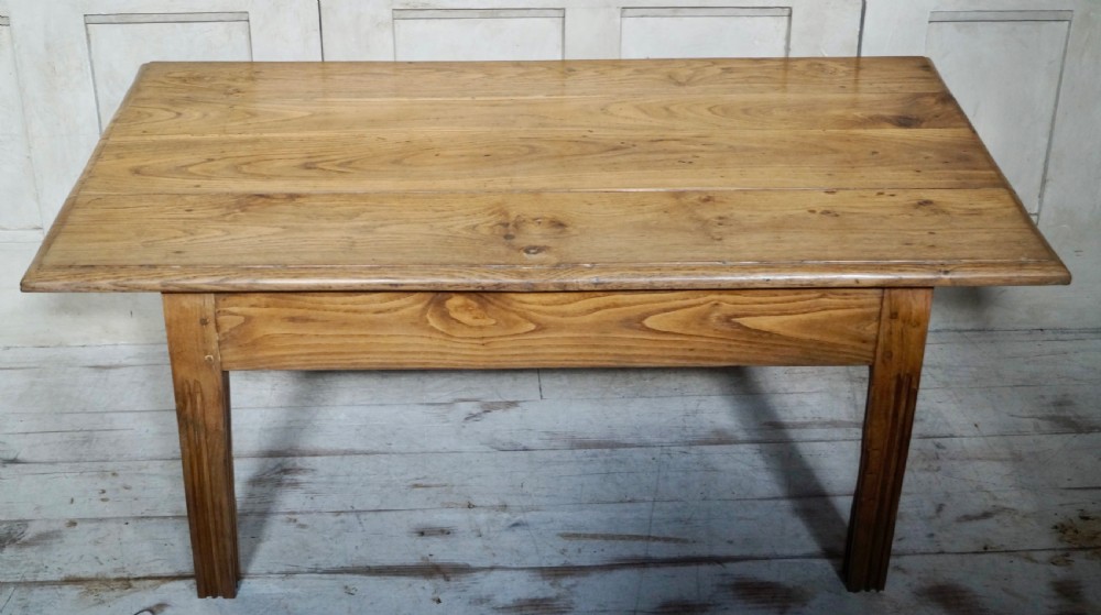 A low rectangular antique French chestnut occasional table with a wide planked top and simple straight legs. View IX