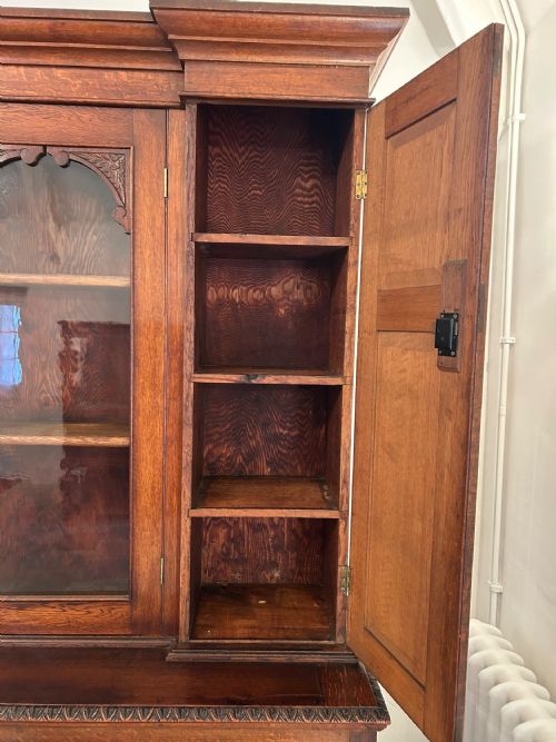 LARGE OAK BOOKCASE ON CARVED CUPBOARD BASE - ADDITIONAL PHOTO 1