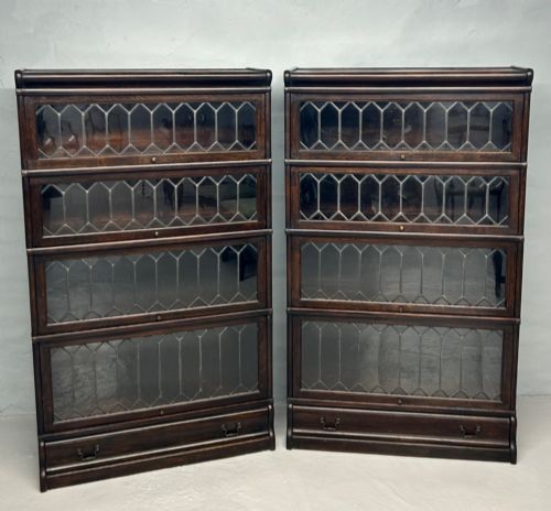 PAIR OF OAK GLOBE WERNICKE BARRISTERS BOOKCASES WITH LEADED DOORS BY