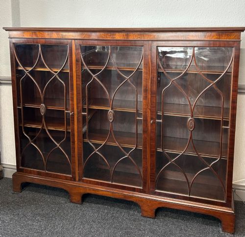 MAHOGANY 3 DOOR GLAZED BOOKCASE BY WYLIE AND LOCHHEAD