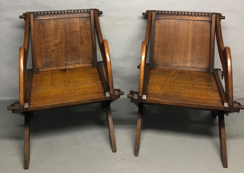 Pair of oak Glastonbury arm chairs