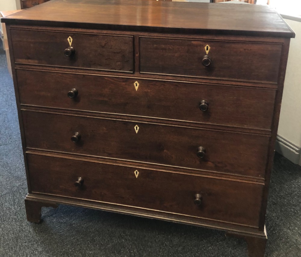 Mid Georgian oak chest of drawers