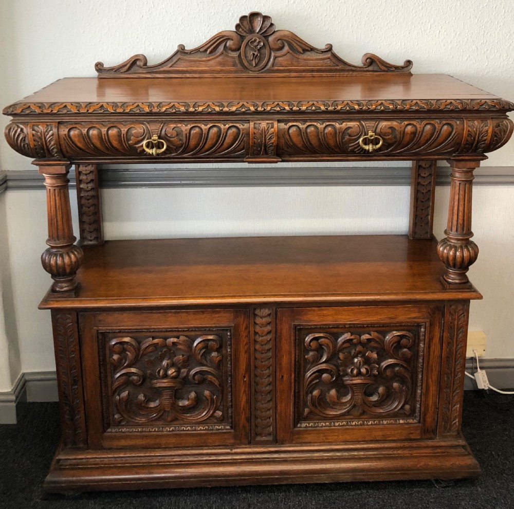 Carved oak sideboard server